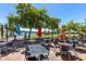 Outdoor patio seating area with a lake in the background at 16629 E Westby Dr, Fountain Hills, AZ 85268