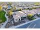 Aerial view of a well-manicured neighborhood with beautiful homes and landscaping at 1697 E Tangelo Pl, Queen Creek, AZ 85140