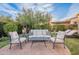 Inviting outdoor seating area with comfortable furniture and manicured landscaping at 1697 E Tangelo Pl, Queen Creek, AZ 85140