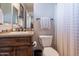 Well-maintained bathroom featuring a granite vanity and tiled shower at 1697 E Tangelo Pl, Queen Creek, AZ 85140