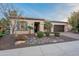 Charming single-story home featuring desert landscaping and inviting front entry, with a convenient attached garage at 1697 E Tangelo Pl, Queen Creek, AZ 85140