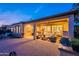 Covered patio area with ample seating, ceiling fan, recessed lighting, and a built in grill at 1697 E Tangelo Pl, Queen Creek, AZ 85140