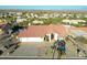 Aerial view of home featuring mature landscaping, a spacious driveway, and inviting curb appeal at 17104 E Rand Dr, Fountain Hills, AZ 85268