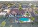 Aerial view of home, backyard pool, and lush landscaping providing a serene oasis at 17104 E Rand Dr, Fountain Hills, AZ 85268