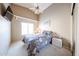 Cozy bedroom with a vaulted ceiling, a window for natural light, and a comfortable bed, creating a relaxing atmosphere at 17104 E Rand Dr, Fountain Hills, AZ 85268