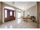 Inviting dining room with tile floors, a chandelier, and large windows, ideal for Gathering meals and gatherings at 17104 E Rand Dr, Fountain Hills, AZ 85268