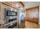 Modern kitchen featuring stainless steel appliances and ample wood cabinet space for storage and style at 17104 E Rand Dr, Fountain Hills, AZ 85268