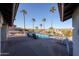 Poolside lounge area with seating, mountain views and plenty of room for entertaining at 17104 E Rand Dr, Fountain Hills, AZ 85268