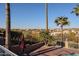 Poolside view of tropical landscaping offering a tranquil ambiance and neighborhood view at 17104 E Rand Dr, Fountain Hills, AZ 85268