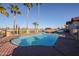 Outdoor pool with a diving board and desert landscaping with mountain views in the background at 17104 E Rand Dr, Fountain Hills, AZ 85268