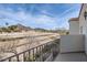 Balcony view showcasing the community's desert landscape, nearby mountains and waterway at 1750 E Ocotillo Rd # 11, Phoenix, AZ 85016