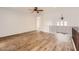 Spacious bonus room with wood-look floors and wrought iron railing at 1750 E Ocotillo Rd # 11, Phoenix, AZ 85016