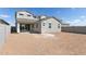 The backyard of this home is large and spacious, with a view of the house at 17712 W Hatcher Rd, Waddell, AZ 85355