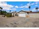 Suburban home featuring desert landscaping, a courtyard entrance, and an attached two-car garage at 1812 W Curry Drive Dr, Chandler, AZ 85224