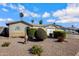 Inviting single-story home with well-manicured desert landscaping and neutral tones at 1812 W Curry Drive Dr, Chandler, AZ 85224