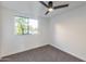 Bedroom with window and ceiling fan at 18811 N 19Th Ave # 2025, Phoenix, AZ 85027