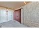 Exterior entrance with double doors and neutral stucco at 18811 N 19Th Ave # 2025, Phoenix, AZ 85027