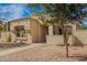 Charming single-story home with desert landscaping, tree in the yard, and neutral color palette at 19802 N Greenview Dr, Sun City West, AZ 85375