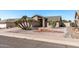 Charming single-story home featuring low maintenance desert landscaping at 19930 N 98Th Ave, Peoria, AZ 85382