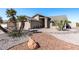 Charming single-story home featuring low maintenance desert landscaping at 19930 N 98Th Ave, Peoria, AZ 85382