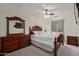 Main bedroom featuring carpet flooring and a ceiling fan at 221 N 151St Ave, Goodyear, AZ 85338