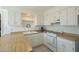 Traditional white kitchen with light countertops and white appliances at 2338 W Lupine Ave, Phoenix, AZ 85029