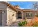 Charming front entrance featuring a decorative iron gate and tiled walkway at 24413 S Lakeway Sw Cir, Sun Lakes, AZ 85248