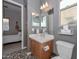 Bathroom featuring a single sink and vanity, and a view to the main bedroom at 27709 N 129Th Ln, Peoria, AZ 85383