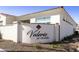 Entrance to Valerio at Ocotillo with well-manicured landscaping and a decorative sign at 2777 W Queen Creek Rd # 13, Chandler, AZ 85248