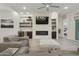 Inviting living room with a stone accent wall, fireplace, built-in shelving, and comfortable seating at 2777 W Queen Creek Rd # 13, Chandler, AZ 85248