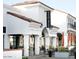 Exterior view of the Sea & Smoke restaurant, featuring a red tiled roof and outdoor seating at 2777 W Queen Creek Rd # 13, Chandler, AZ 85248