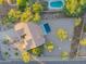 Aerial view of a home with a pool and desert landscaping, offering privacy at 29399 N 67Th Way, Scottsdale, AZ 85266