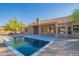 Inviting backyard pool and covered patio area perfect for outdoor entertaining and desert living at 29399 N 67Th Way, Scottsdale, AZ 85266