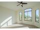 Bright bedroom with large windows, a ceiling fan, and neutral carpeting at 29399 N 67Th Way, Scottsdale, AZ 85266