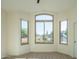 Bright bedroom with ceiling fan and natural lighting from large windows at 29399 N 67Th Way, Scottsdale, AZ 85266