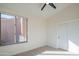 Bedroom featuring large window and sliding door closet at 29399 N 67Th Way, Scottsdale, AZ 85266