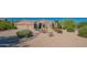 Well-maintained home with gravel landscaping, mature greenery, and spacious three-car garage at 29399 N 67Th Way, Scottsdale, AZ 85266