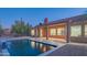 Sparkling pool, covered patio with desert landscaping at 29399 N 67Th Way, Scottsdale, AZ 85266