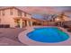 Backyard oasis featuring pool, patio, and outdoor living area at 29576 N Gecko Trl, San Tan Valley, AZ 85143