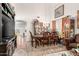 Traditional dining room featuring high ceilings, a chandelier, and an elegant dining set for formal entertaining at 29576 N Gecko Trl, San Tan Valley, AZ 85143