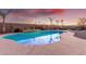 Backyard pool with Baja shelf and water feature at 29576 N Gecko Trl, San Tan Valley, AZ 85143