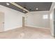 Bright bedroom features wood flooring, ceiling fan, recessed lighting, and a modern ceiling design at 3033 E Roma Ave, Phoenix, AZ 85016