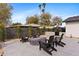 Cozy fire pit area with comfortable Adirondack chairs, perfect for outdoor entertaining and relaxation at 3033 E Roma Ave, Phoenix, AZ 85016