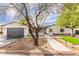 Charming home featuring xeriscaped landscaping, modern accents, and a welcoming entrance at 3033 E Roma Ave, Phoenix, AZ 85016