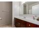 Well-lit bathroom features a vanity with ample counter space at 30940 W Indianola Ave, Buckeye, AZ 85396