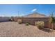 Backyard featuring low maintenance landscaping with a stunning mountain backdrop at 34074 N Beeblossom Trl, San Tan Valley, AZ 85144