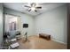 A versatile room with a ceiling fan, neutral walls, and carpet, perfect for a flex space at 35322 N 27Th Ln, Phoenix, AZ 85086