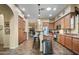 Gourmet kitchen with a center island, breakfast bar, and abundant cabinetry at 35322 N 27Th Ln, Phoenix, AZ 85086