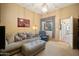 Comfortable living room area with natural light, neutral tones, and archway detail at 35322 N 27Th Ln, Phoenix, AZ 85086