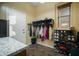 Organized mud room with hooks, shelves, and a granite countertop for added convenience and storage at 35322 N 27Th Ln, Phoenix, AZ 85086